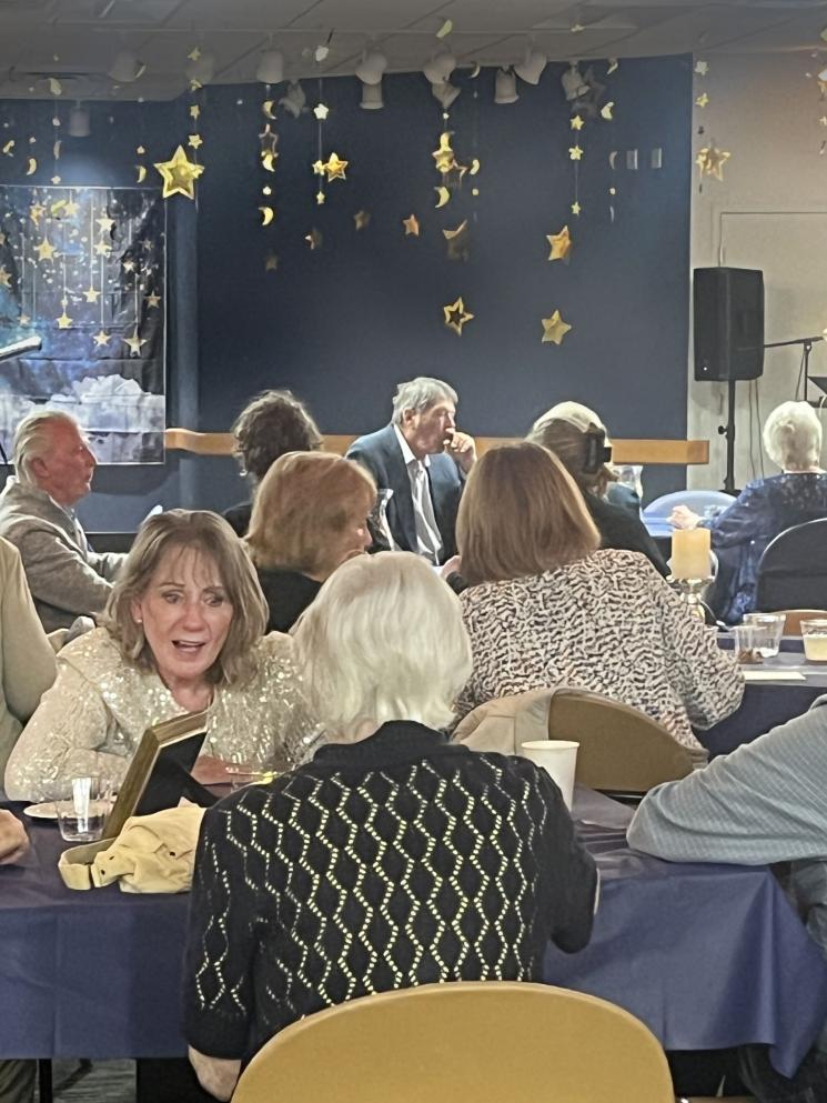 people talking at senior prom 2025