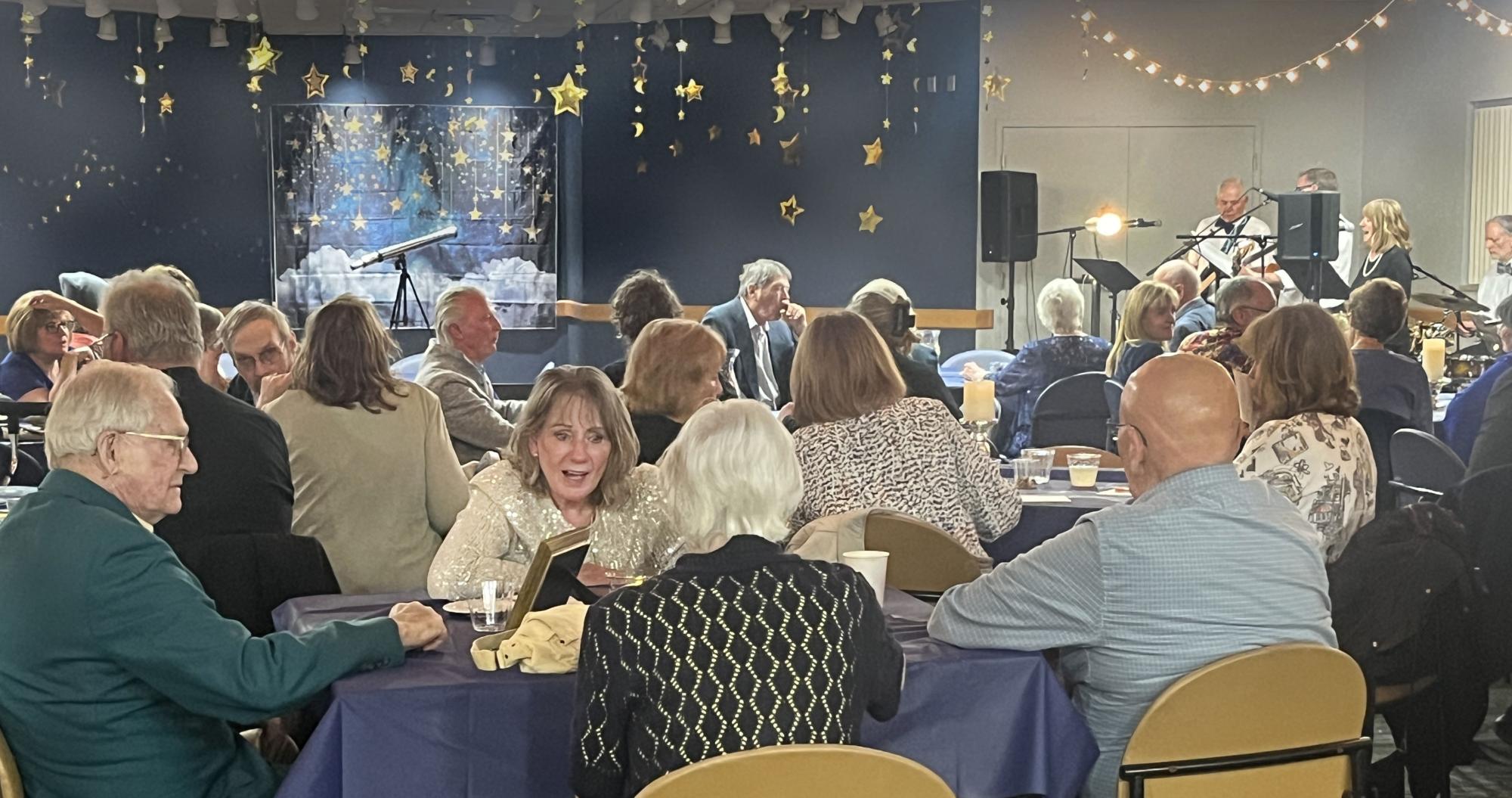 people talking at senior prom 2025