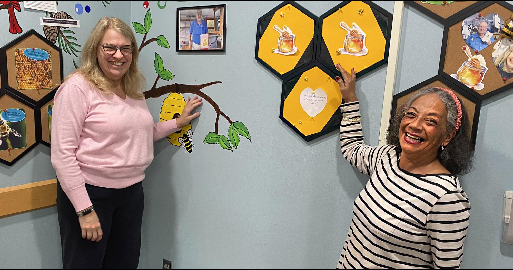 People hanging wall decorations