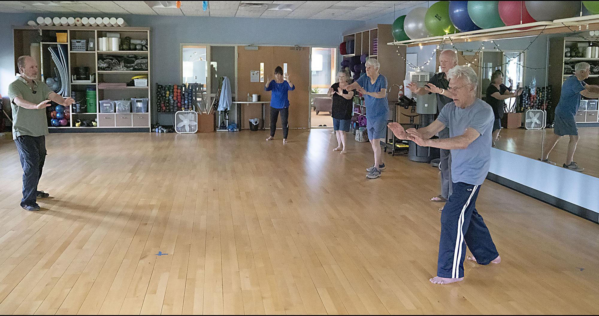 People practicing Tai Chi forms