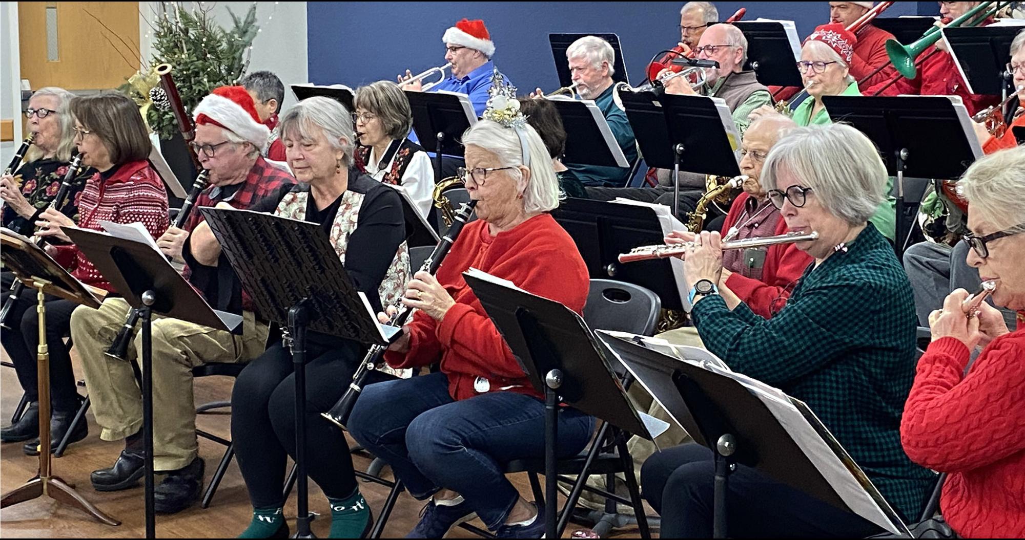 FiftyNorth Band members perform in Xmas garb